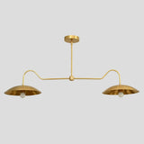 Overhead view of brass double dome chandelier – minimalist modern pendant light with curved arms and dual dome shades