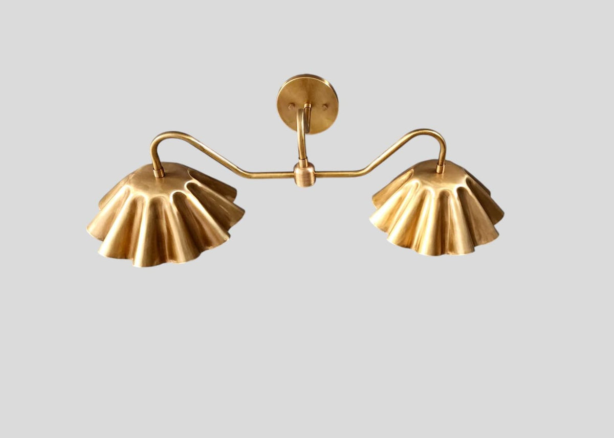 Rear view of handmade brass double wall sconce with artistic ruffled shades