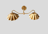 Rear view of handmade brass double wall sconce with artistic ruffled shades