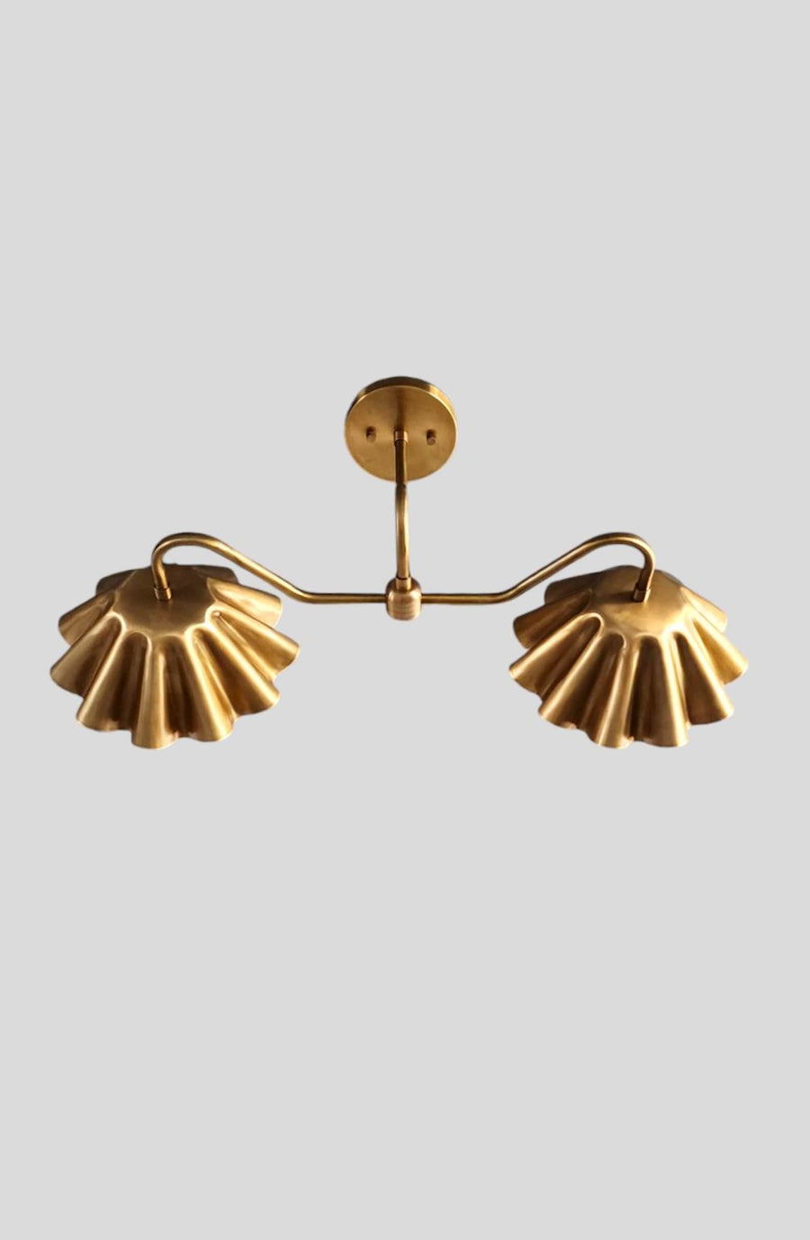 Handmade brass double wall sconce with ruffled shades – front view