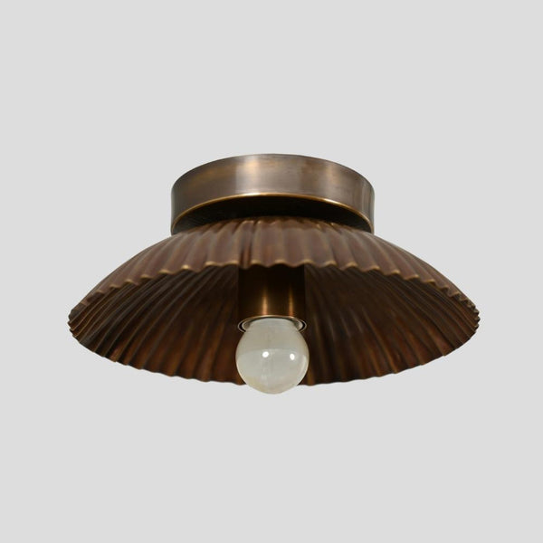 Handmade brass flush mount ceiling light with scalloped shade and vintage finish