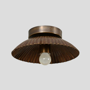Handmade brass flush mount ceiling light with scalloped shade and vintage finish