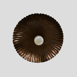 Top view of vintage scalloped brass ceiling light with round shade design