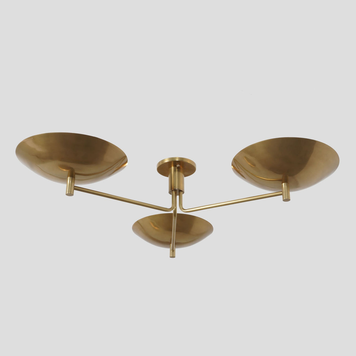 Modern 3-light brass flushmount ceiling light with brushed matte finish and minimalist form