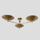 Modern 3-light brass flushmount ceiling light with brushed matte finish and minimalist form