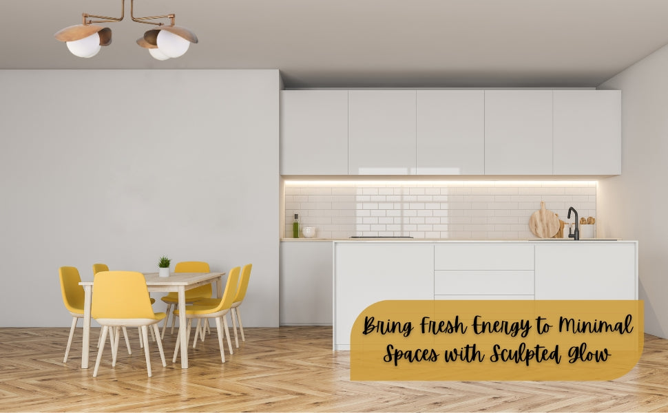 Brass ceiling light installed in a minimalist kitchen with white cabinets and yellow dining chairs