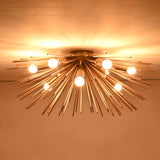 Warm glowing brass flushmount chandelier with starburst rods and bright bulbs