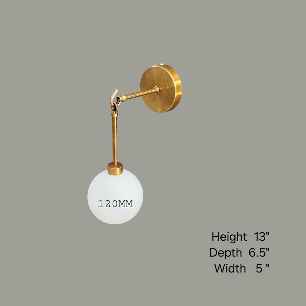Brass wall sconce with frosted globe shade and dimension chart – 13 inch height, 6.5 inch depth, 5 inch width