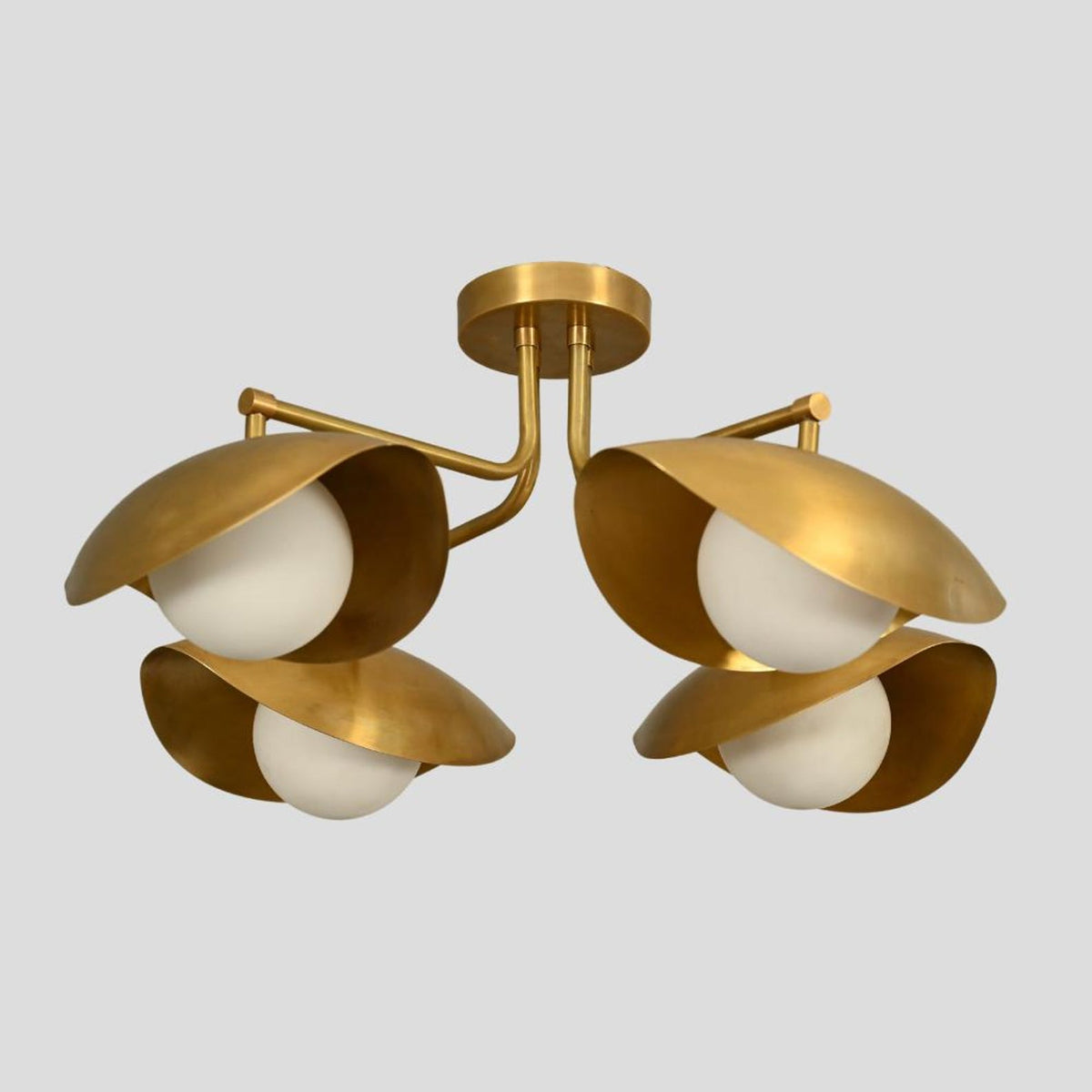 Brass Leaf Studio 4-light chandelier with lacquer-coated brass finish and sculptural bowl-shaped shades, handmade for contemporary interiors