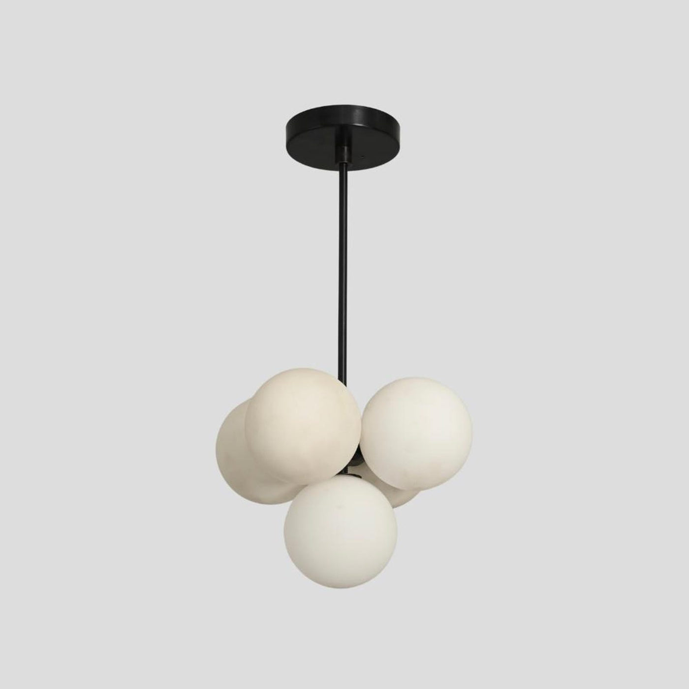 Handmade brass 5-light cluster chandelier with frosted glass globes in a modern black rod design – Brass Leaf Studio