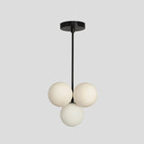 Modern cluster chandelier with five frosted glass globes and black ceiling mount – Brass Leaf Studio handmade lighting