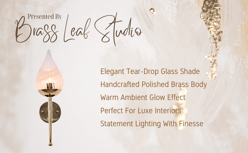 Elegant teardrop brass wall sconce with features listed: handcrafted body, ambient glow, and luxe appeal – Brass Leaf Studio branding

