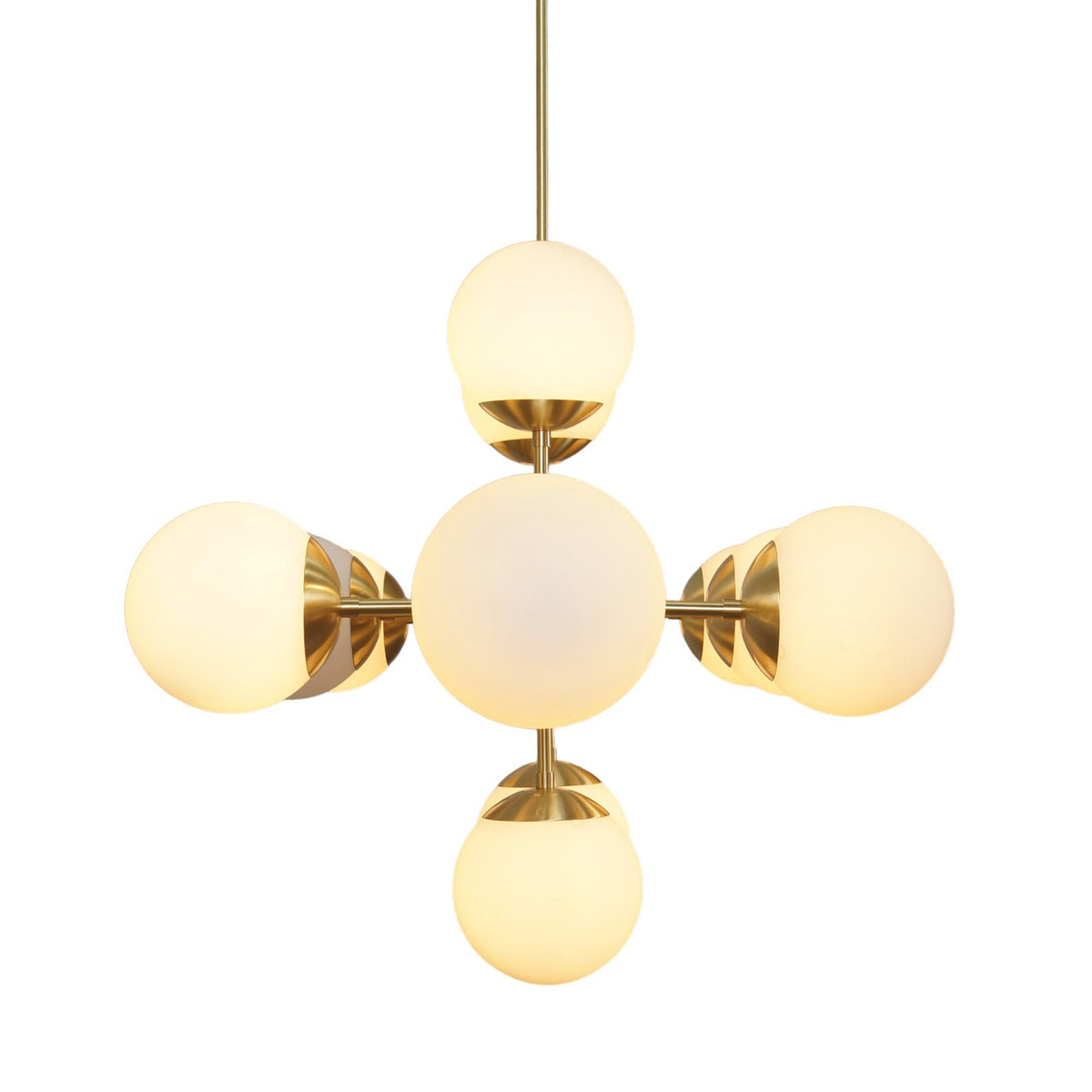 Overhead view of glowing brass linear chandelier with frosted glass globes – artisan modern lighting by Brass Leaf Studio