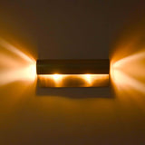 Brass Leaf Studio cylinder wall light with clean horizontal profile for modern interiors