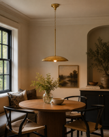 Brass Leaf Studio Discus pendant light with sculptural dome profile for kitchen, hallway, dining, and entryway lighting