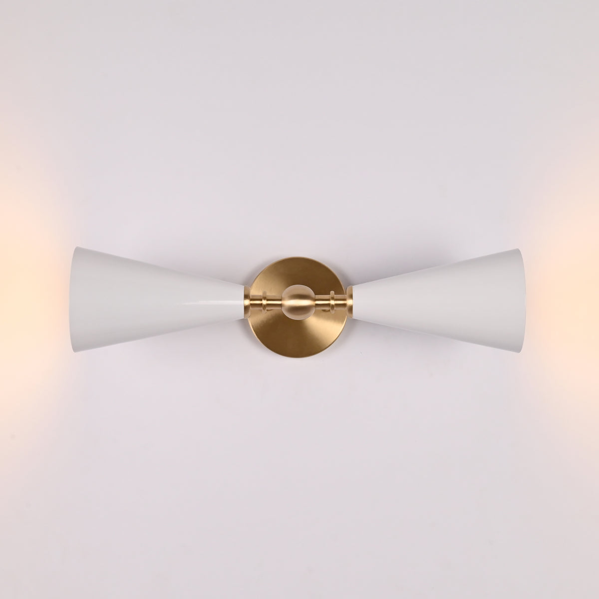 Brass Leaf Studio double cone sconce with white enamel painted shades and brushed brass hardware