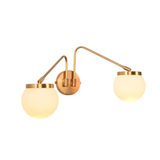 Brass Leaf Studio double globe wall light with elegant wide profile for stylish home and boutique interiors