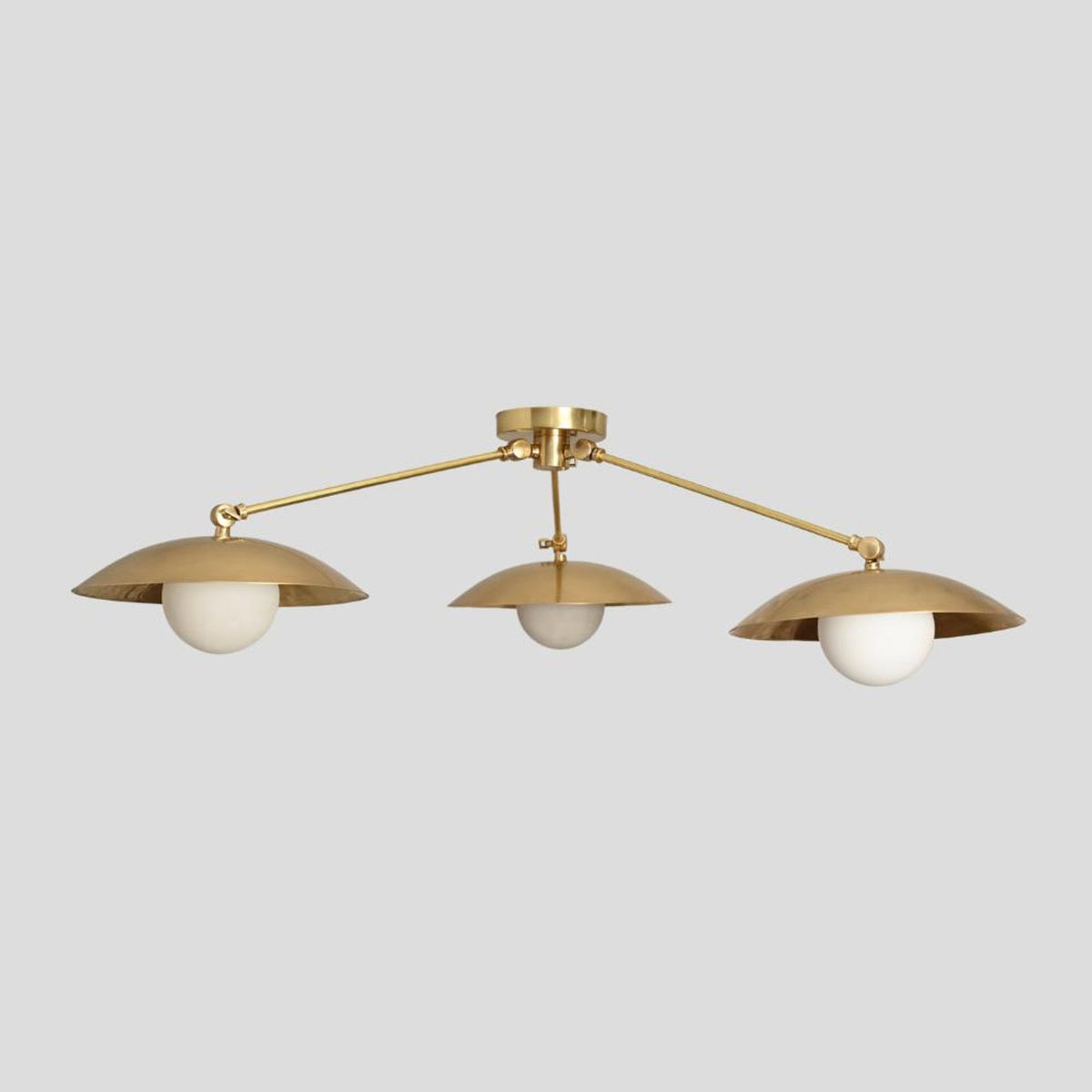 Brass Leaf Studio handmade 3-light flushmount chandelier with brushed brass finish and sculptural bowl shades, perfect for modern interiors.