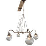 Side view of modern linear brass chandelier with six ribbed glass globes – artisan lighting design by Brass Leaf Studio