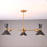 Modern 3-light brass chandelier with black cone shades and industrial arms, handcrafted by Brass Leaf Studio.