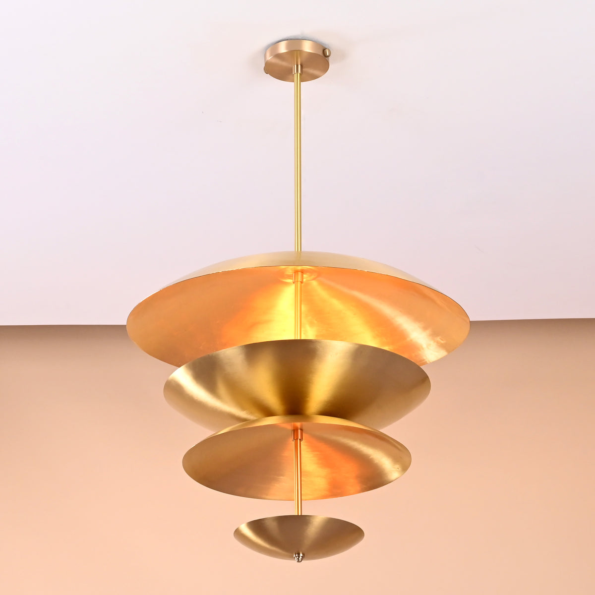 Geometric layered brass chandelier with sculpted disc shades handcrafted in brushed finish