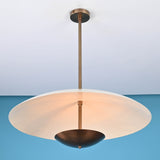 Modern brass pendant light with wide dome shade and suspended design, handmade by Brass Leaf Studio, ideal for living rooms and dining spaces.