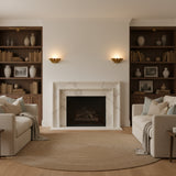 Brass Leaf Studio Palermo wall sconce with ruffled brass shade and cozy upward ambient illumination