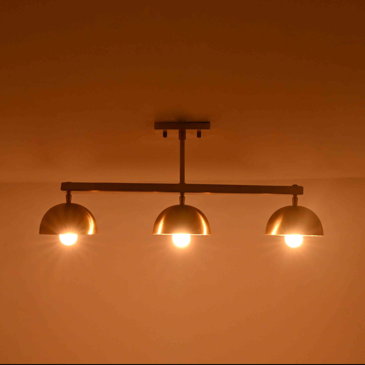 Brass Leaf Studio semi flush ceiling light with solid brass components and three dome shades for refined interiors