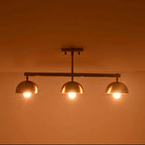 Brass Leaf Studio semi flush ceiling light with solid brass components and three dome shades for refined interiors