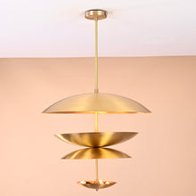 Handcrafted triple bowl brass pendant light with minimalist sculpted design in brushed lacquer finish