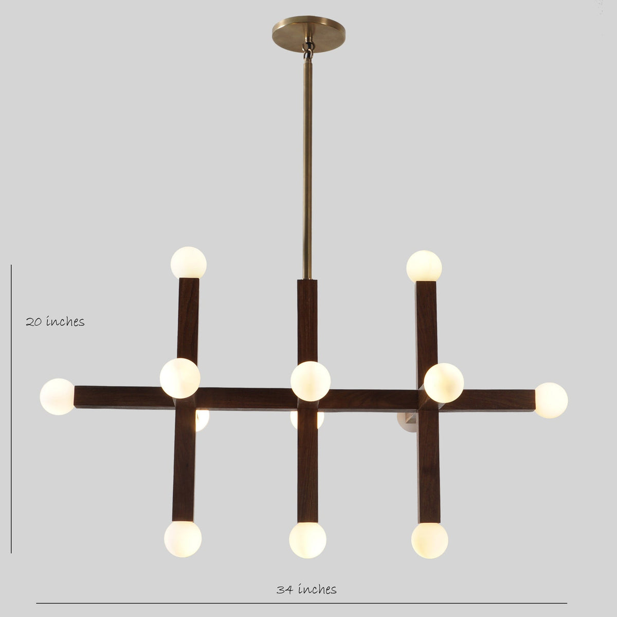 Geometric wood chandelier with brass stem and frosted globes – labeled 34-inch width and 20-inch height – handmade by Brass Leaf Studio