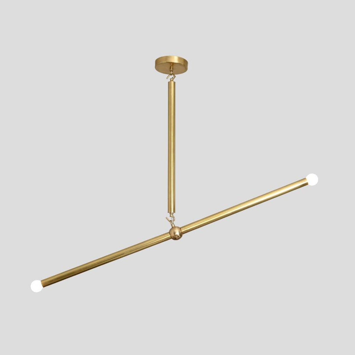 Straight front view of modern brass linear chandelier, featuring slim rods and elegant minimalist design for contemporary interiors.