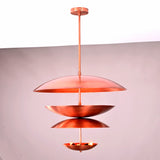 Studio photograph of a copper-finish multi-tier bowl-shaped chandelier with indirect uplighting, crafted in solid brass by Brass Leaf Studio.