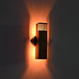 Brass patina hallway wall sconce with slim rectangular tube design and warm decorative lighting for contemporary spaces