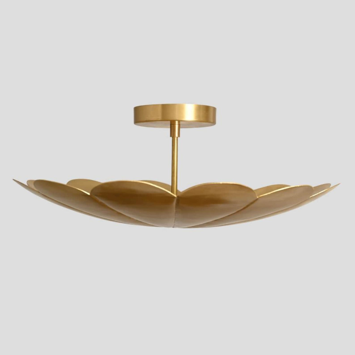 Profile view of brass petal chandelier – elegant flush mount ceiling light with petal-shaped brass design