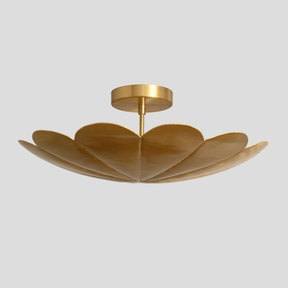 Side angled view of brass petal chandelier – modern floral ceiling fixture with handcrafted brass petals