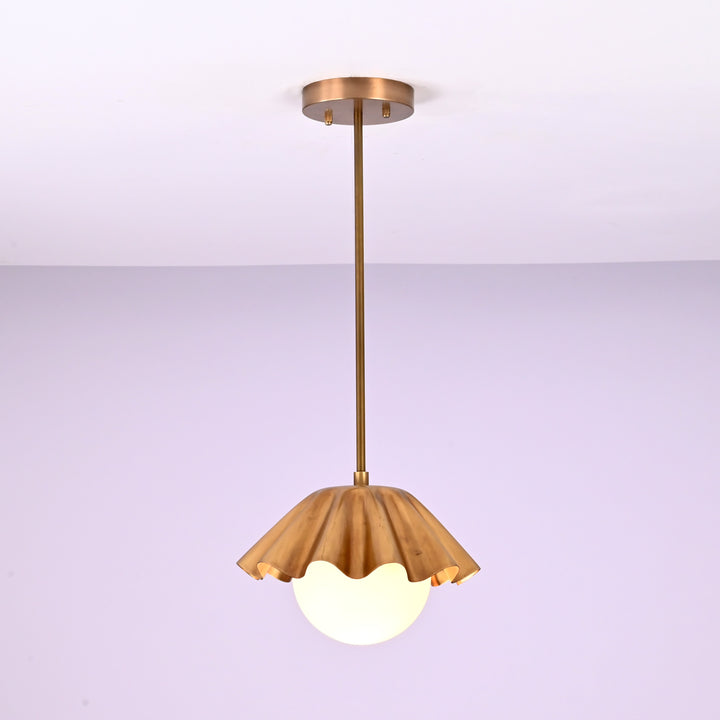Modern brass pendant light with ruffled shade and frosted globe bulb, handmade ceiling lamp by Brass Leaf Studio