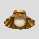 Brass fluted ceiling light with scalloped edge design and central globe bulb
