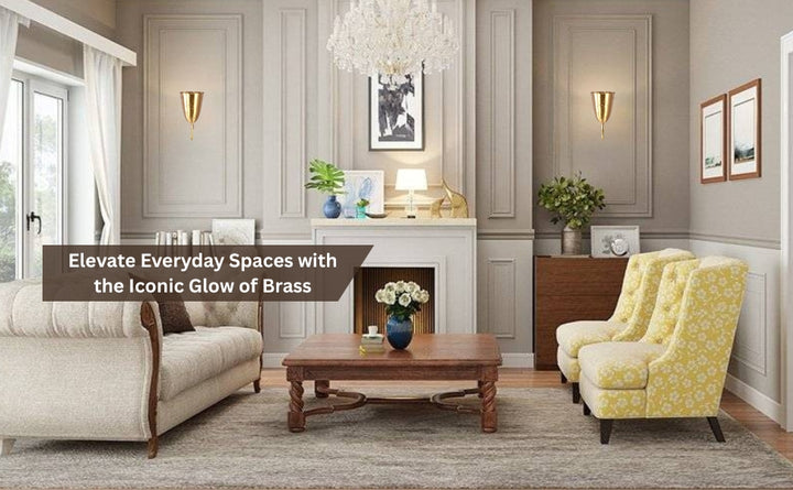 Pair of brass wall sconces adding warm accent lighting in a classic living room