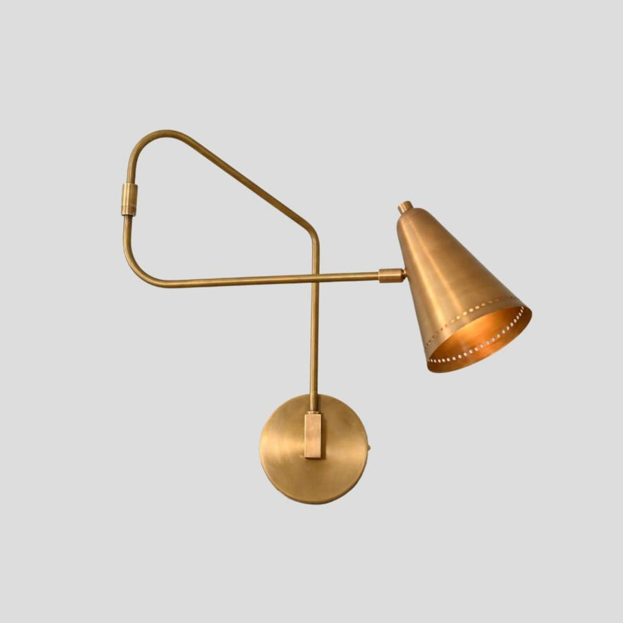 Handmade brass swing arm wall sconce with adjustable cone shade, modern minimalist design front view
