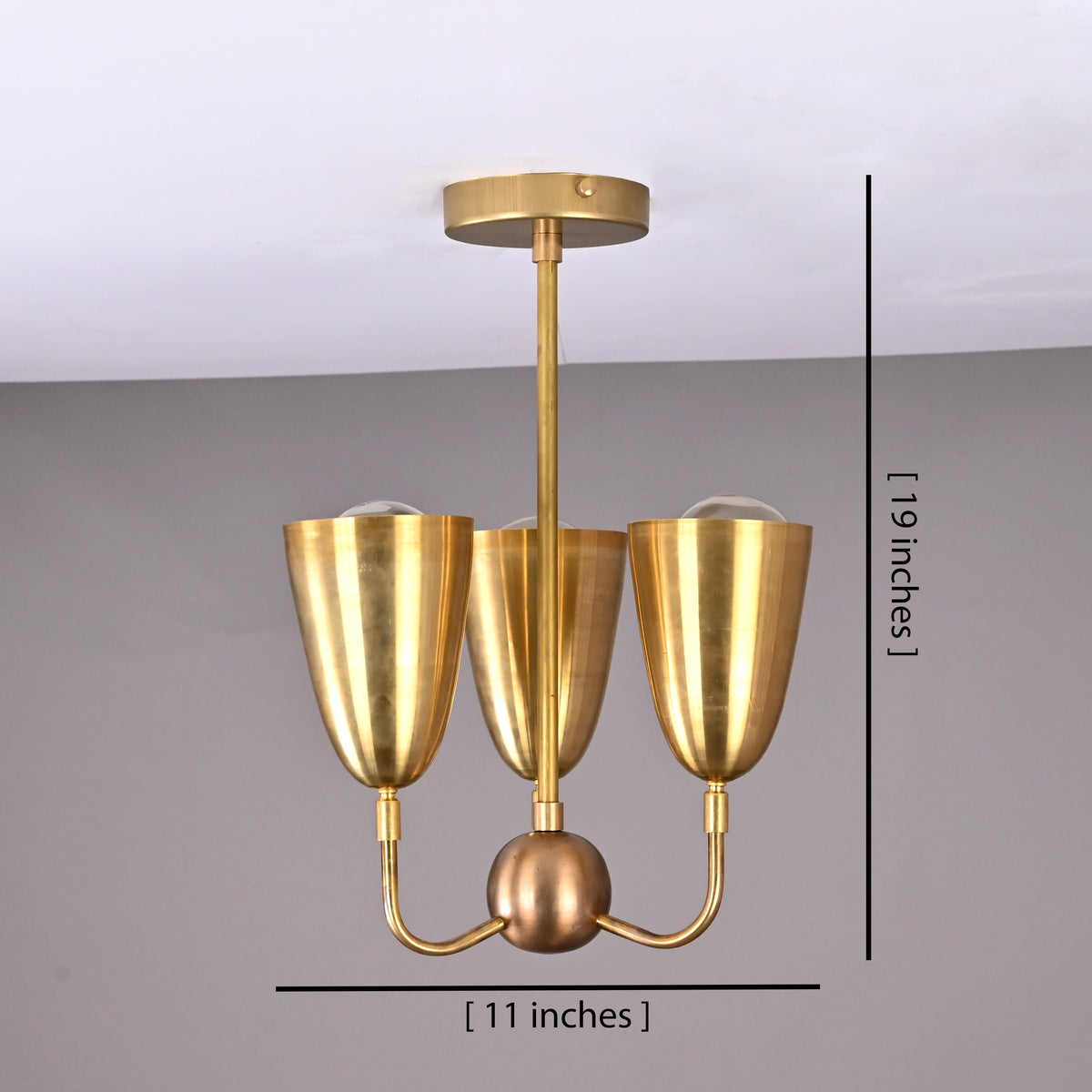 Brass triple cup ceiling light showing 11-inch width and 19-inch height, modern mid-century brass flushmount chandelier.