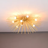Close-up of brass urchin chandelier with soft warm lighting highlighting the intricate brass rod arrangement.