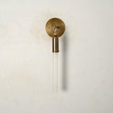 Slim brass wall sconce with vertical frosted glass shade, handcrafted minimalist modern wall light