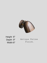 Antique patina brass wall light showing height 6 inches, width 6 inches, and depth 9 inches, handcrafted by Brass Leaf Studio