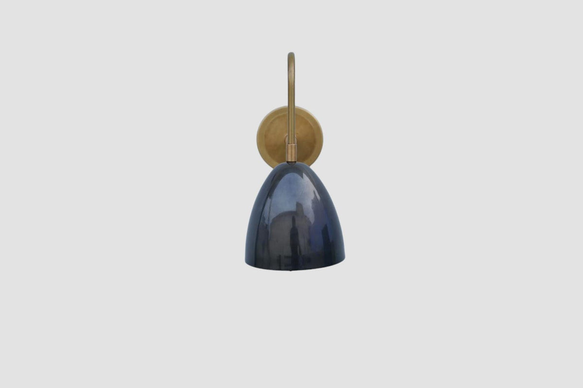 Front view of handmade brass wall sconce with polished blue dome shade, perfect for living room or bedroom lighting