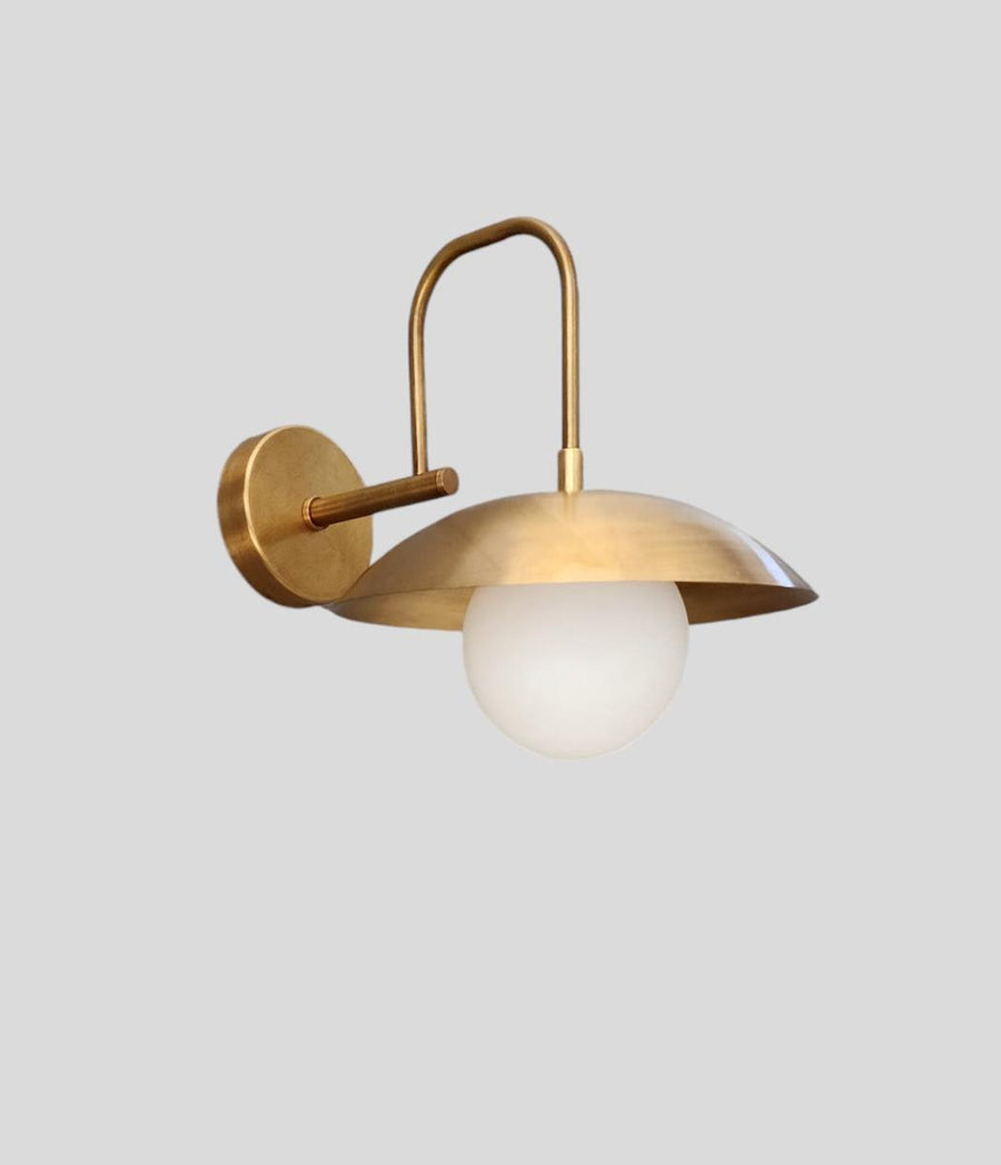 Handmade brass wall sconce light with frosted globe and brushed brass finish – modern industrial wall lighting