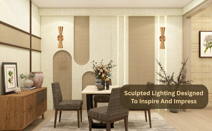 Pair of brass double cone wall sconces mounted in a modern dining room with sculpted wall design