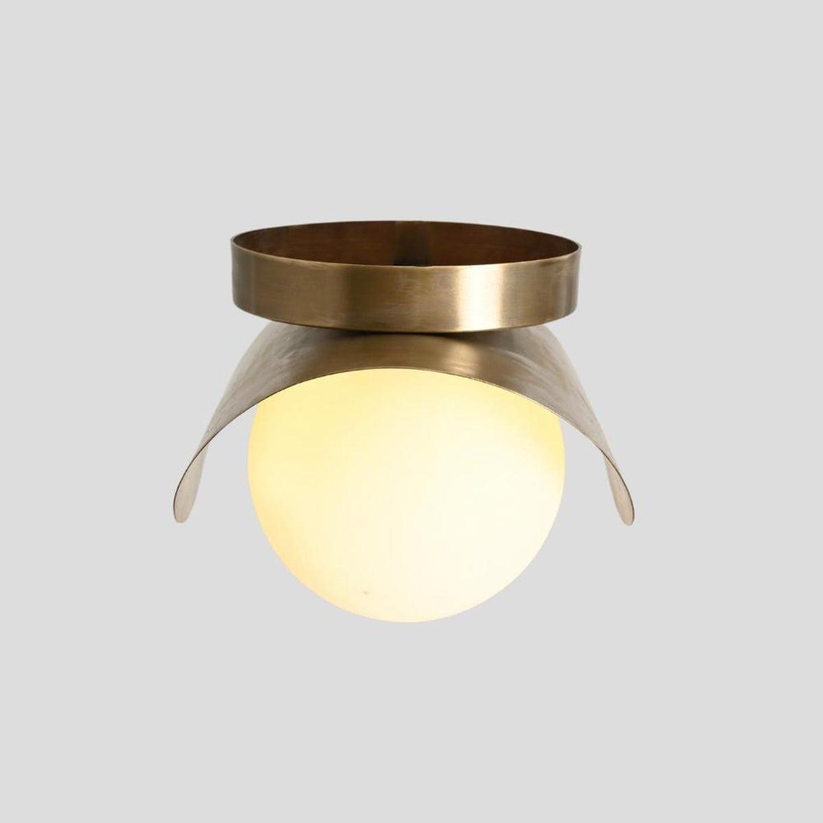 Modern brass wave ceiling light with opal glass globe – sculptural handmade flush mount fixture