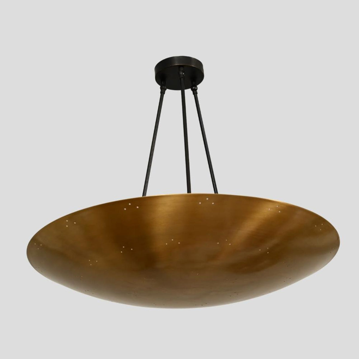 Close-up of brass dome chandelier – modern suspended ceiling light with elegant bowl design and brushed brass finish
