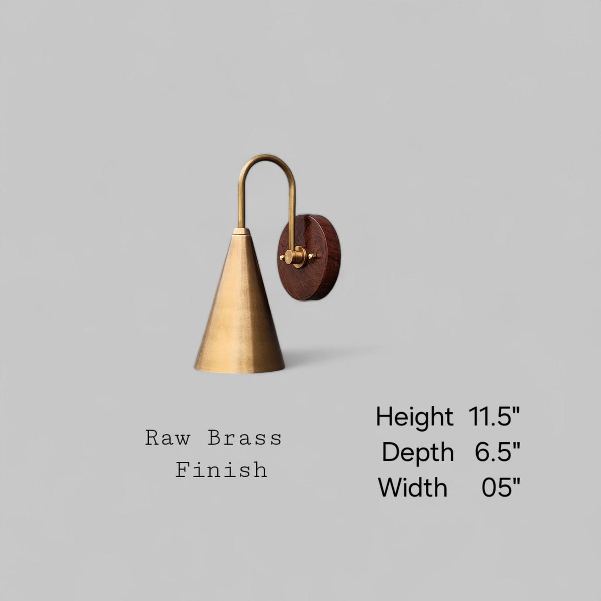 Modern brass and wood wall sconce labeled with 11.5-inch height, 6.5-inch depth, and 5-inch width in raw brass finish.
